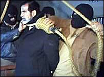 Saddam Hussein moments before his death on the gallows at 0600 (0300GMT)